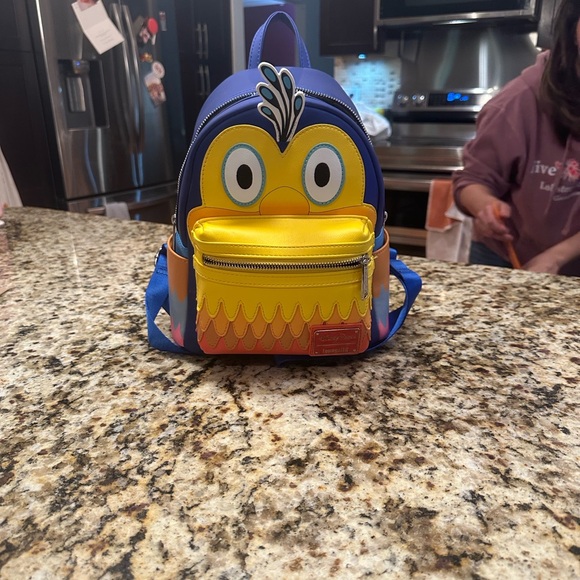 Kevin loungefly bag from Disney parks